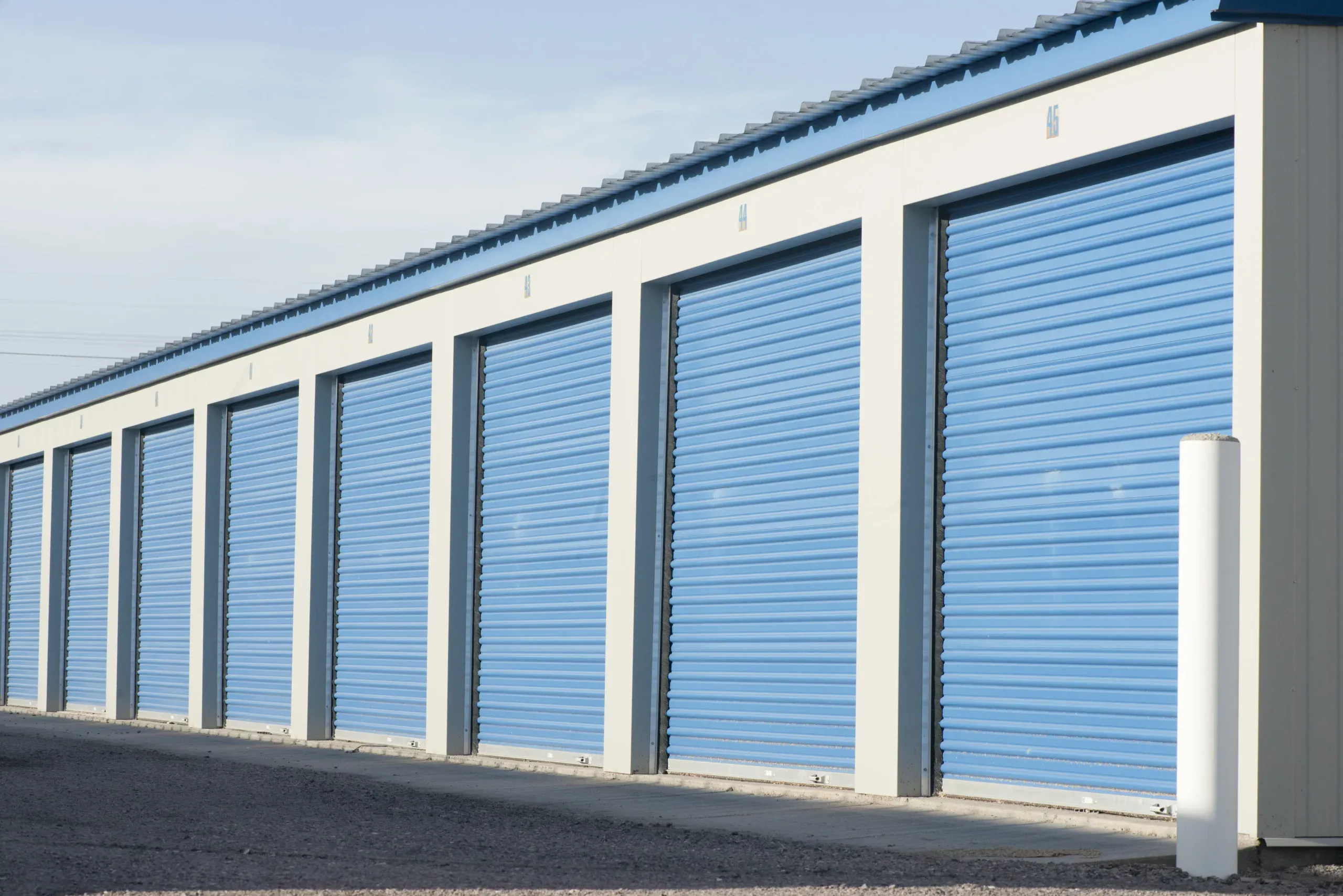 row of storage units self storage management canada scaled